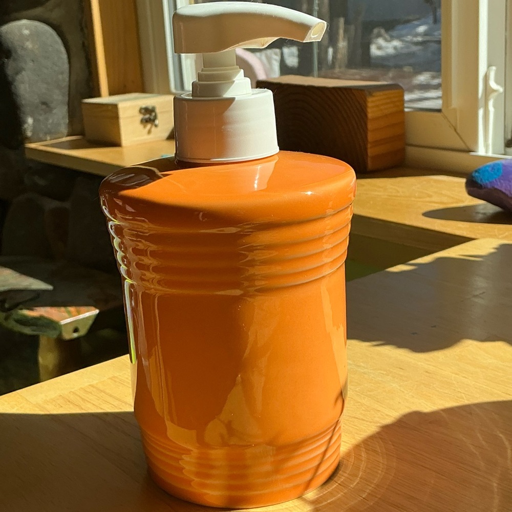 Fiesta! bright orange soap dispenser.